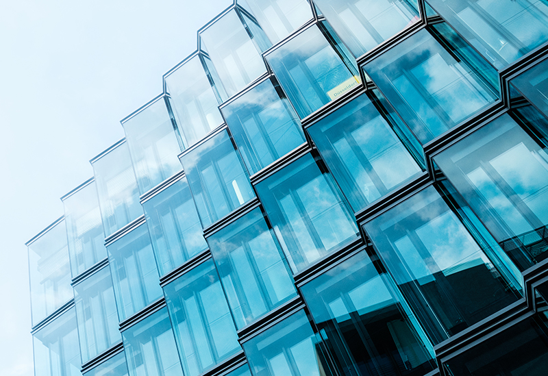 real-estate-debt2.jpg angular building glass facade