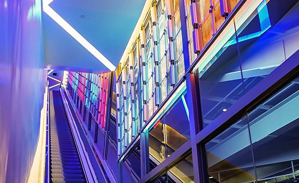 A stairway with fluorescent lights